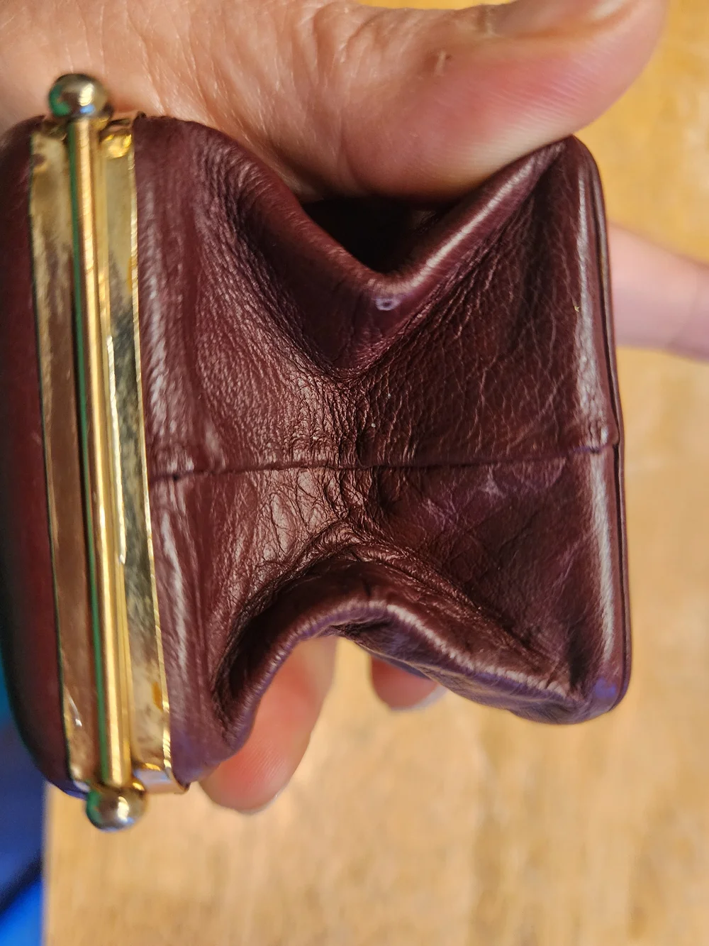 vintage Christian Dior maroon leather kiss-lock coin purse embossed Logo